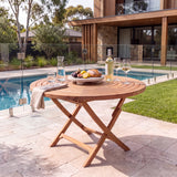 Teak Garden Furniture Spiral 120cm Round Folding Table 4cm Top - Sculptural Folding Teak Dining Table – Australian outdoor lifestyle setting